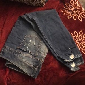 Plus size distressed blue jeans